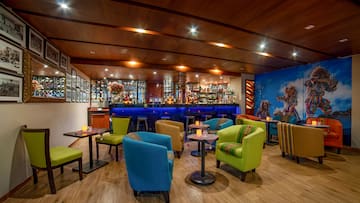 a room with tables and chairs