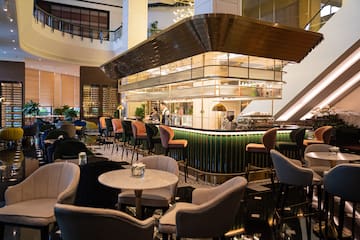 a restaurant with tables and chairs