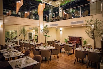 a room with tables and chairs