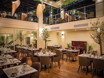 a room with tables and chairs