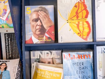 a shelf with magazines on it