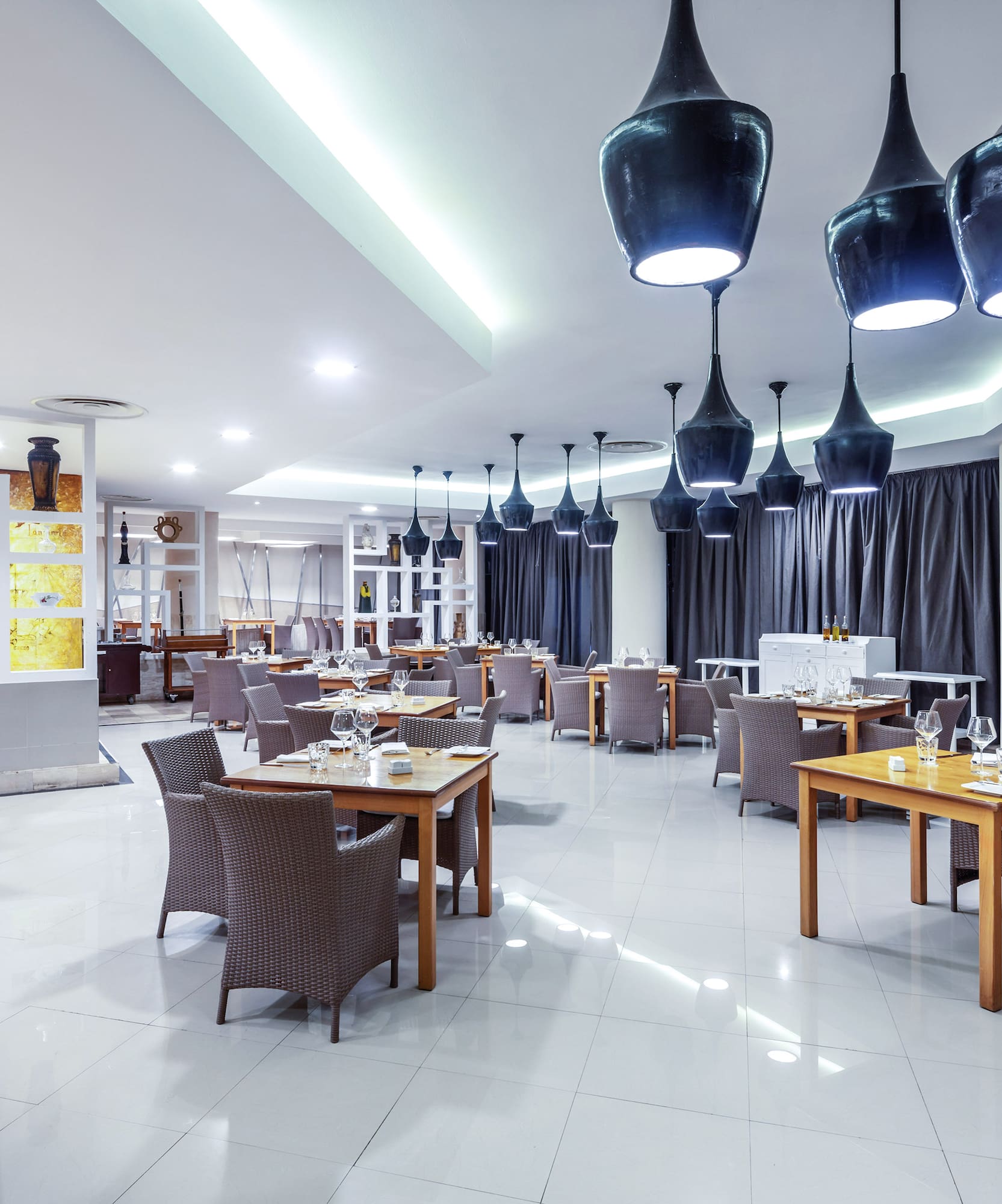 a room with tables and chairs