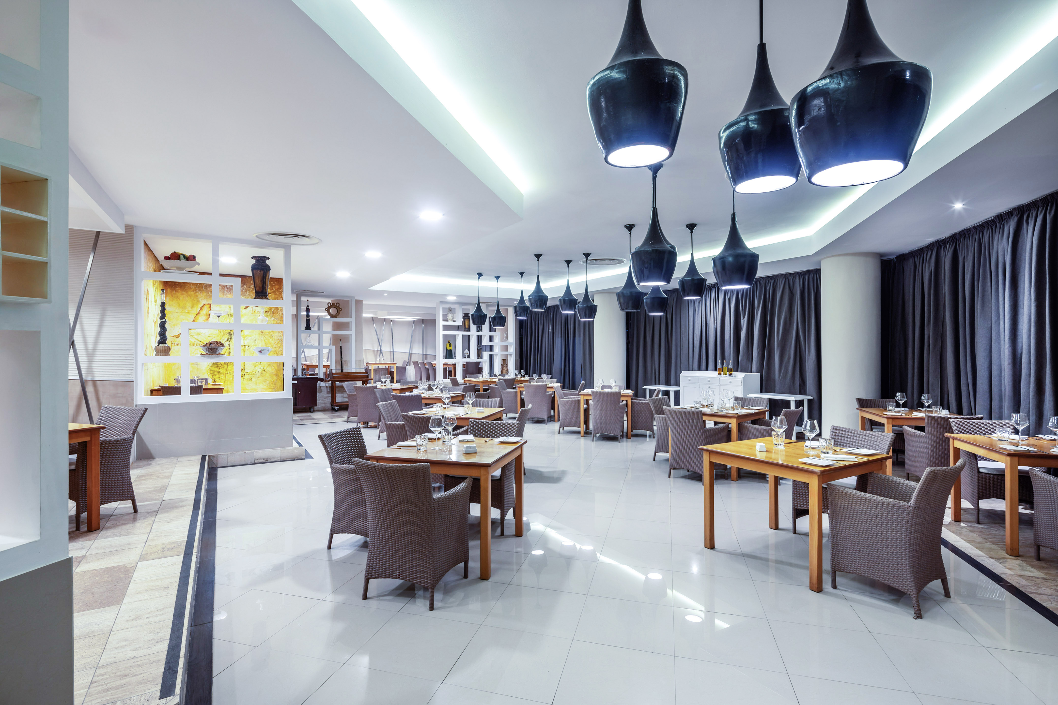 a room with tables and chairs