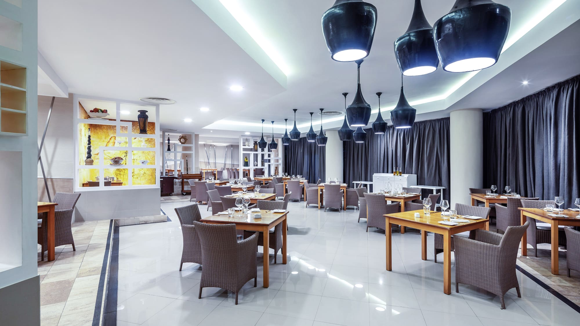 a room with tables and chairs