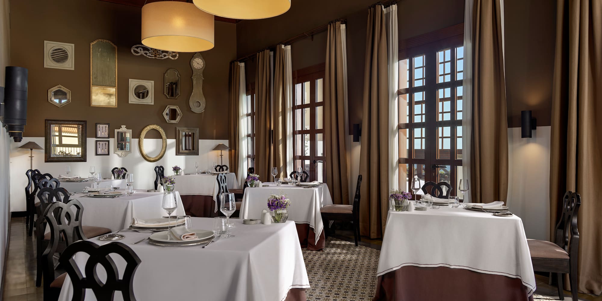 a room with tables and chairs