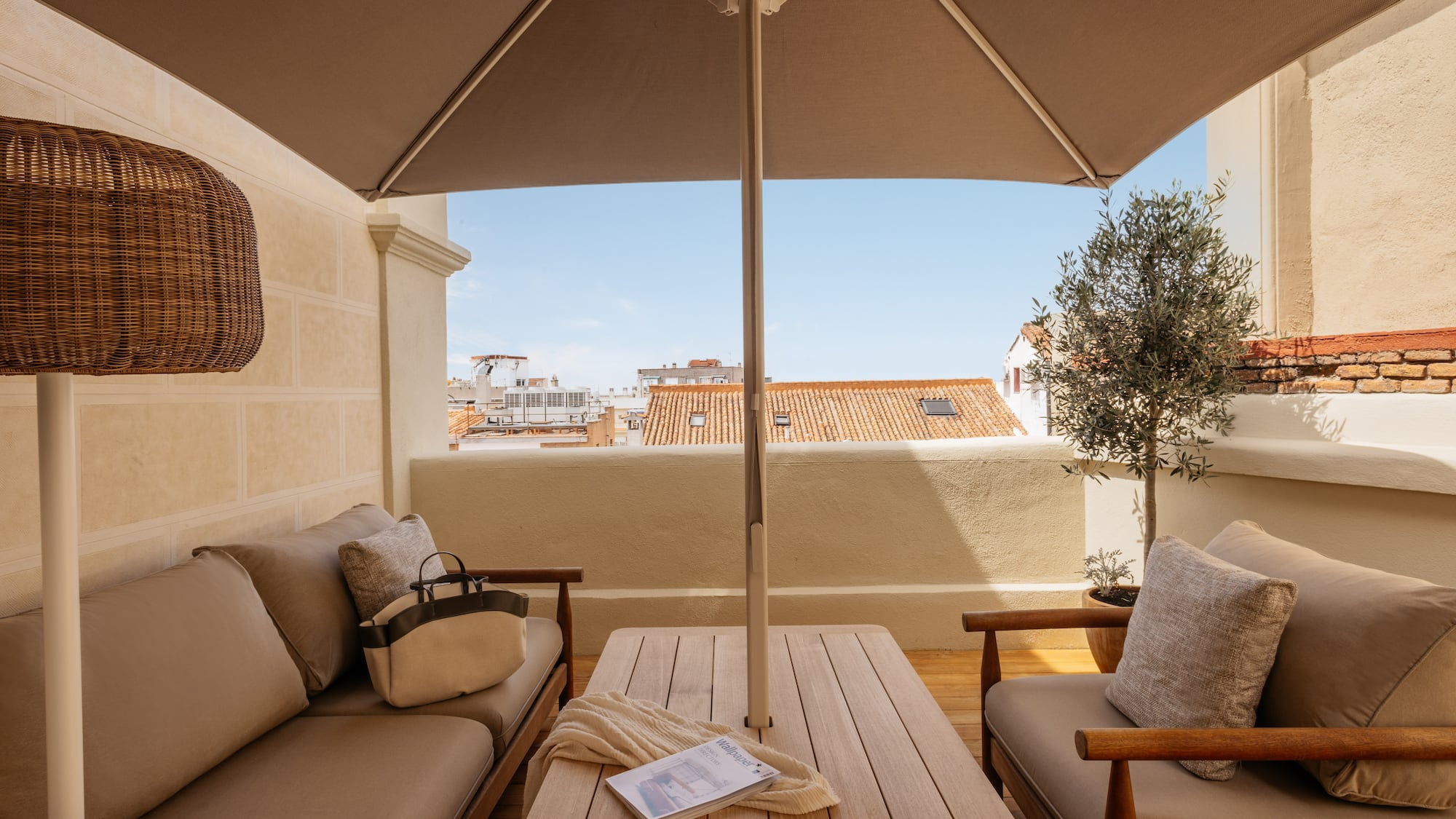 a patio with a table and chairs
