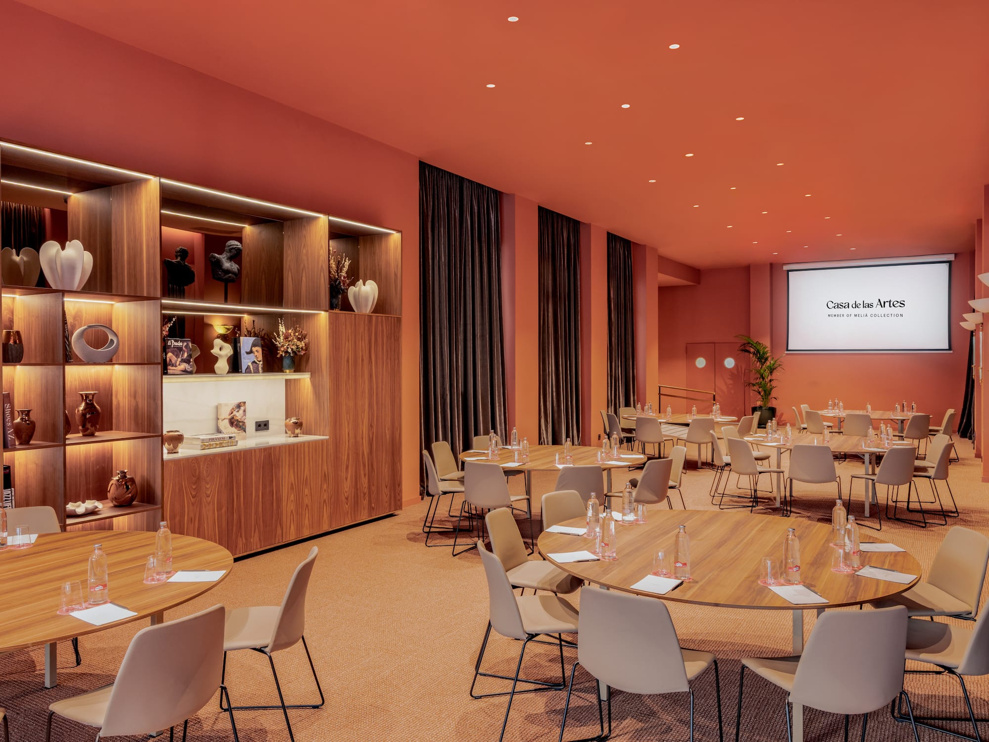 a room with tables and chairs