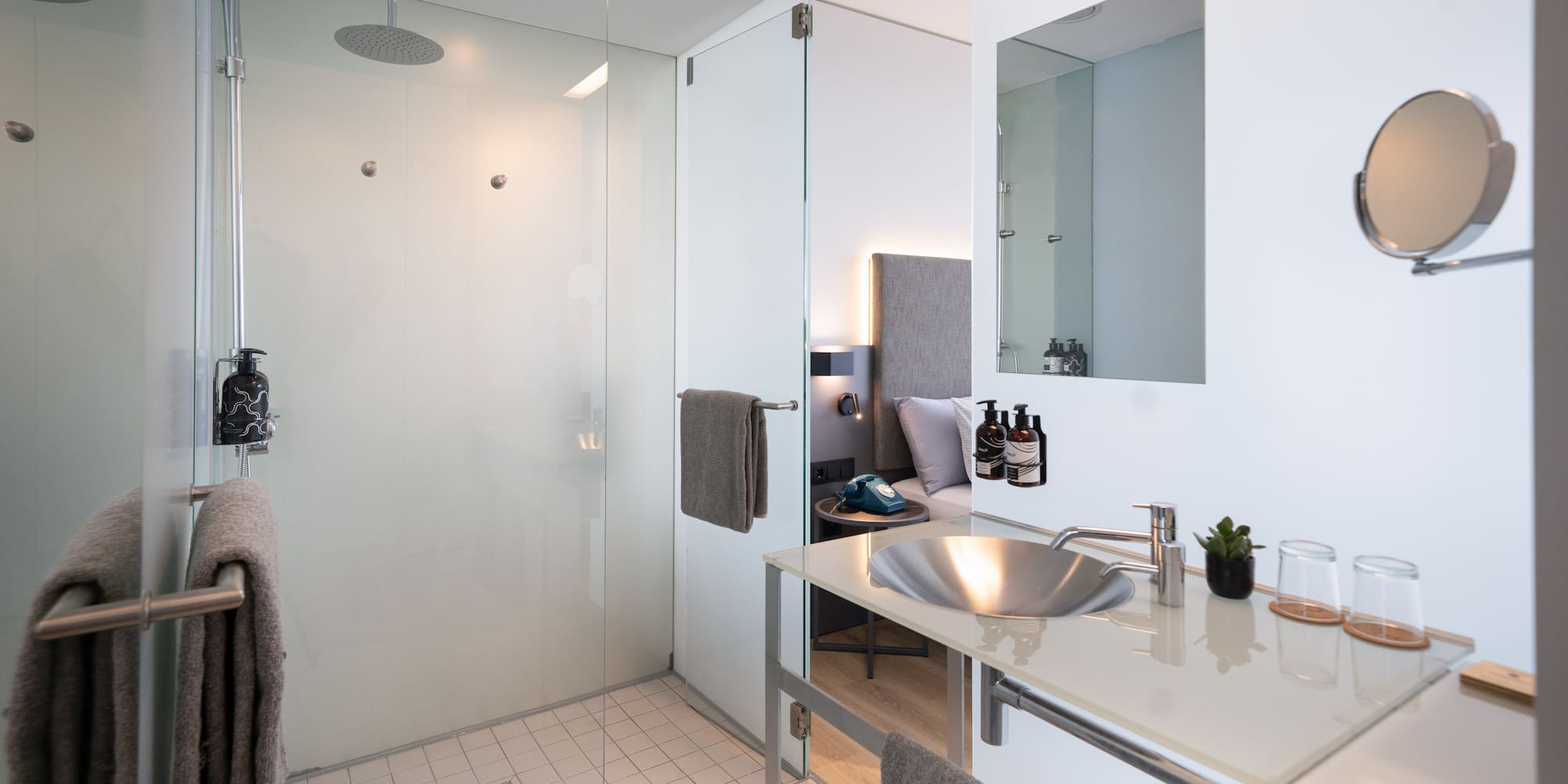 a bathroom with a shower and sink