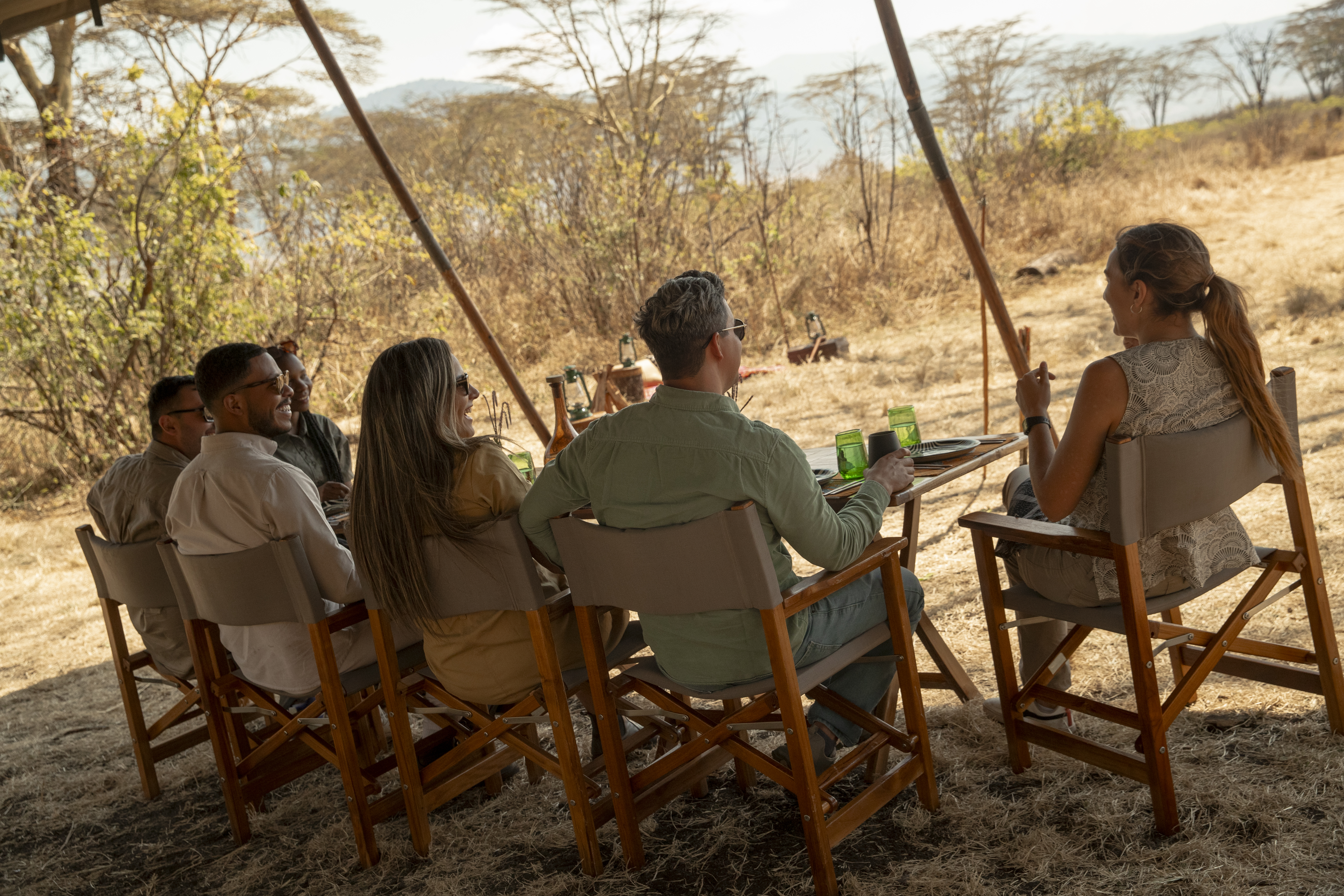 a group of people sitting at a table