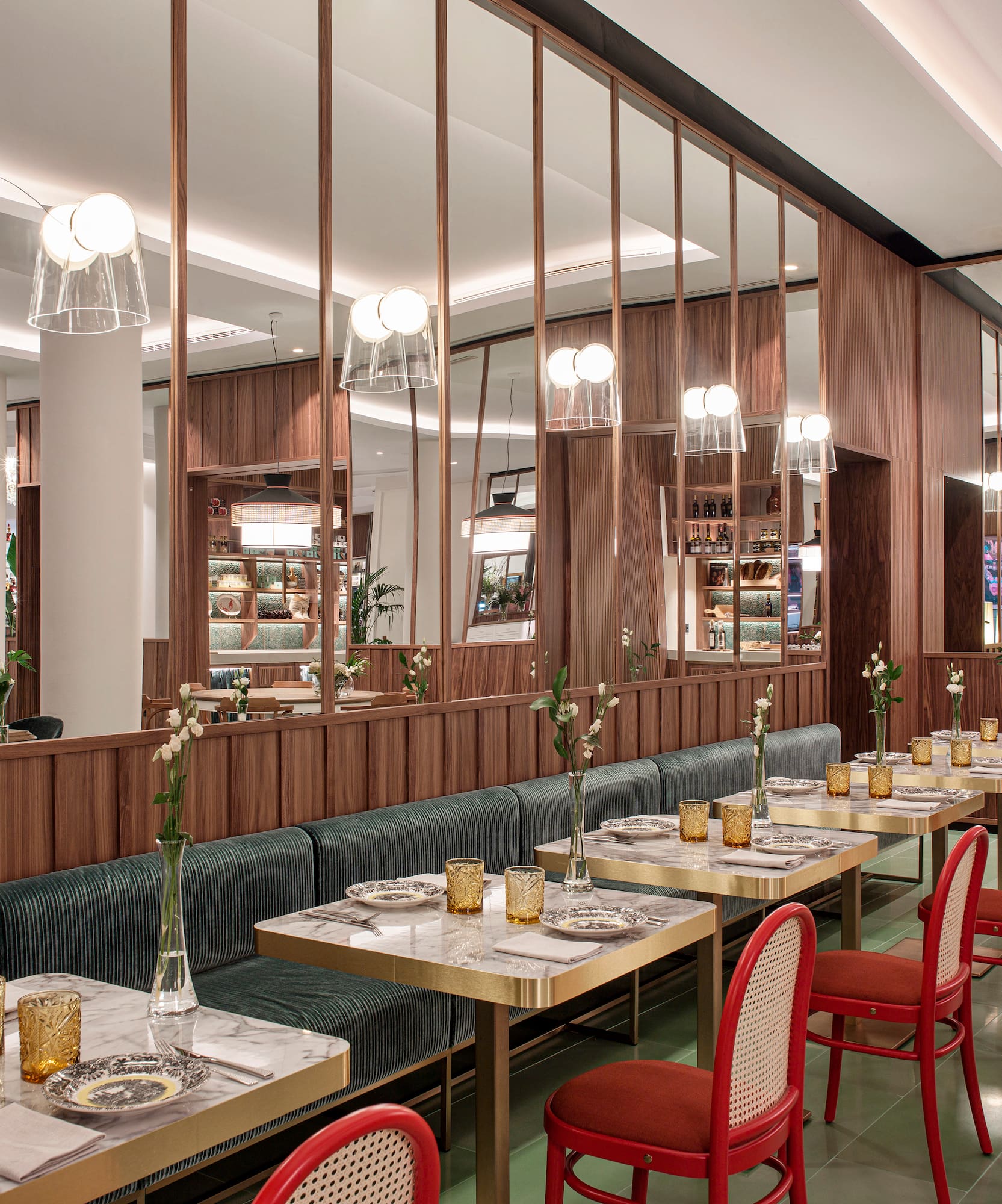 a restaurant with tables and chairs