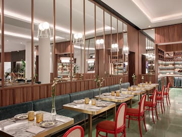 a restaurant with tables and chairs