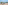 Balcony with ocean view, sandy beach, straw umbrellas, and outdoor seating.