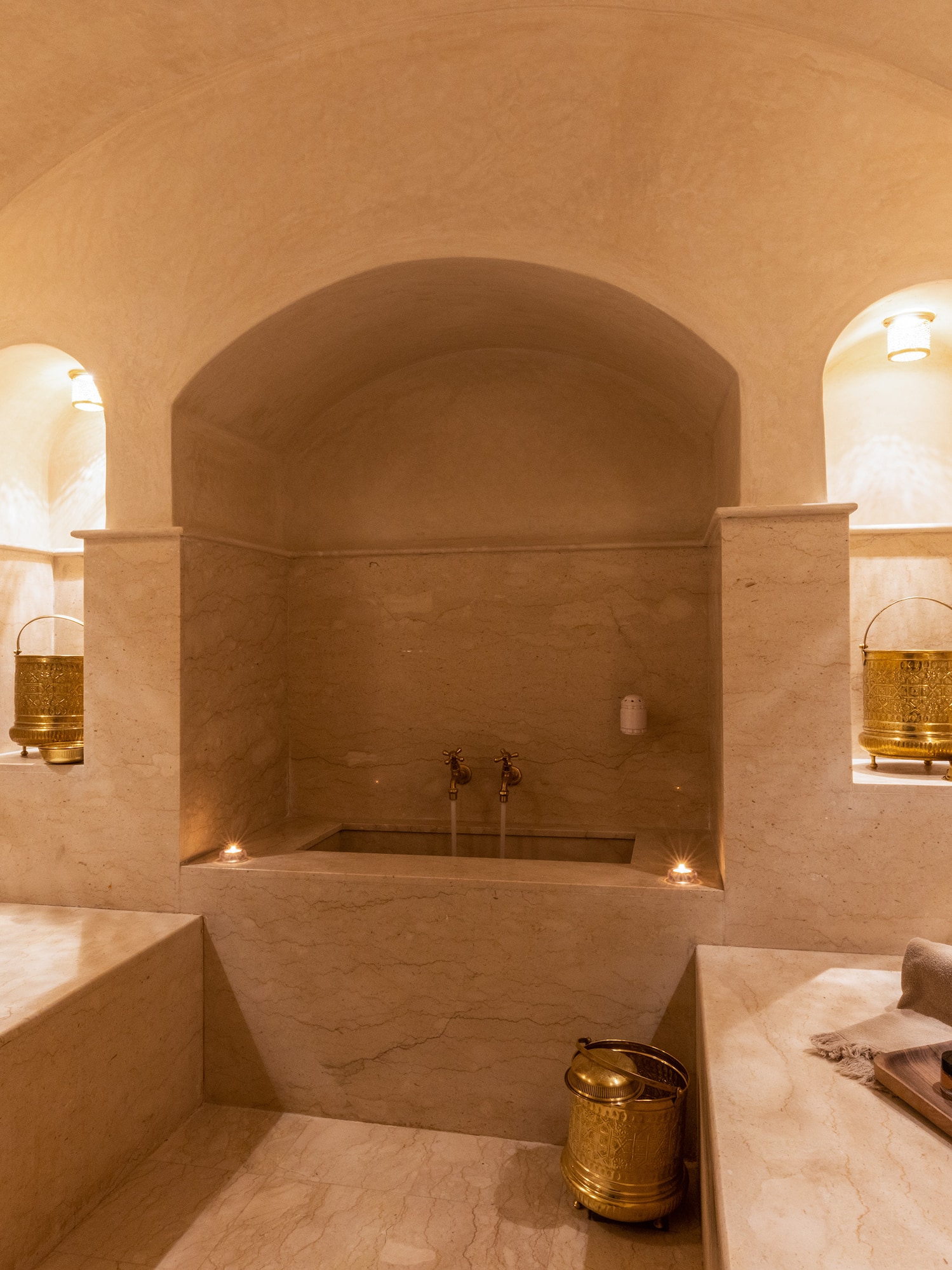 a bathroom with a bathtub and a tub