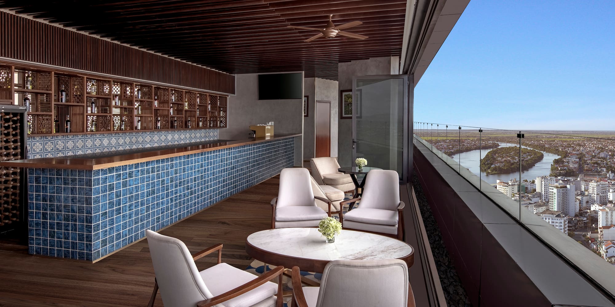 a patio with chairs and tables