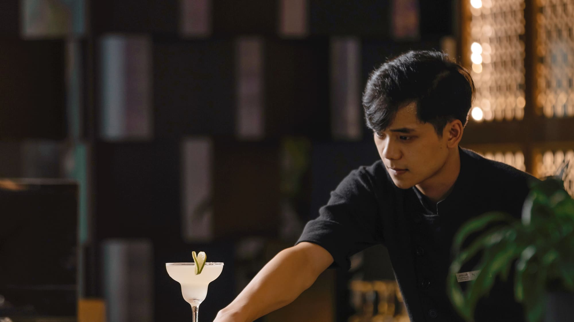 a man standing at a bar