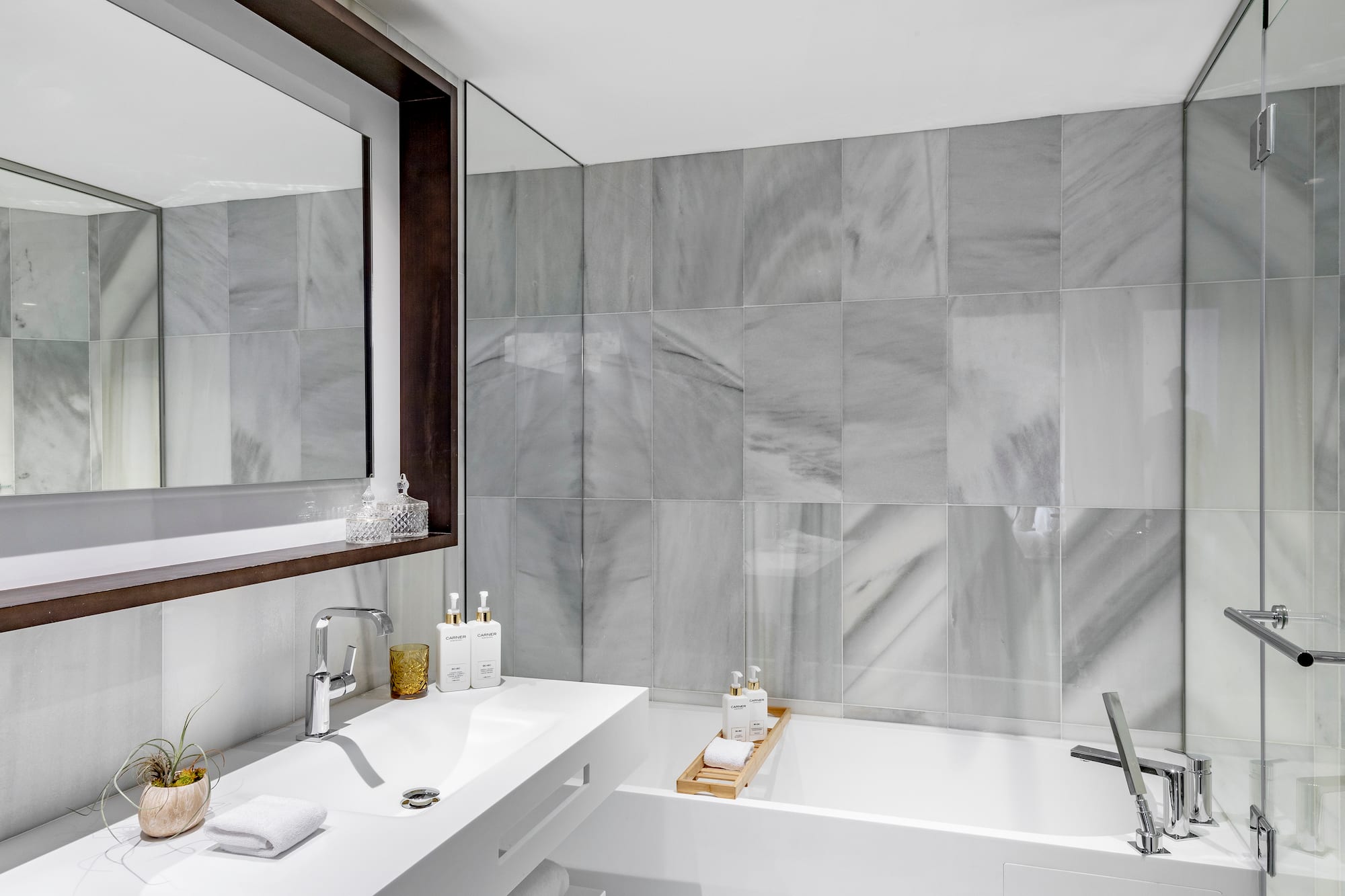 a bathroom with a sink and a bathtub