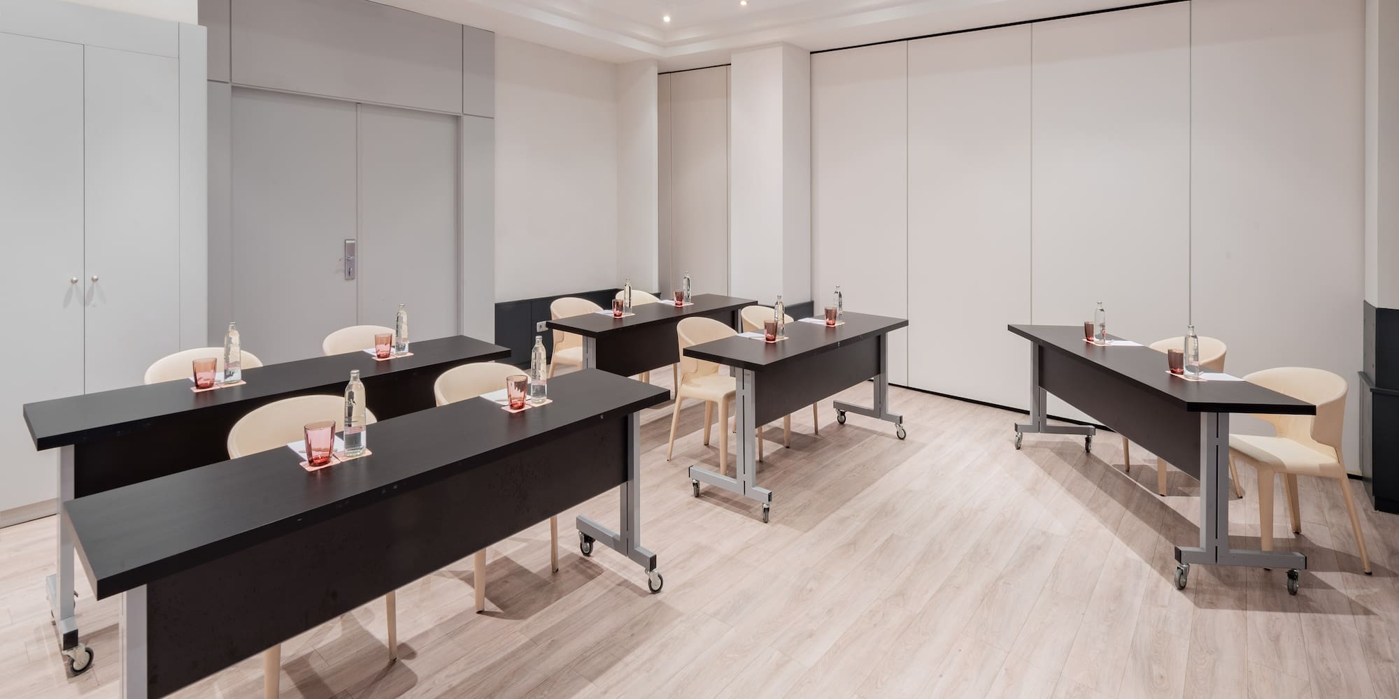 a room with tables and chairs