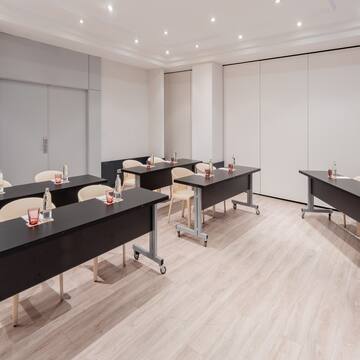 a room with tables and chairs