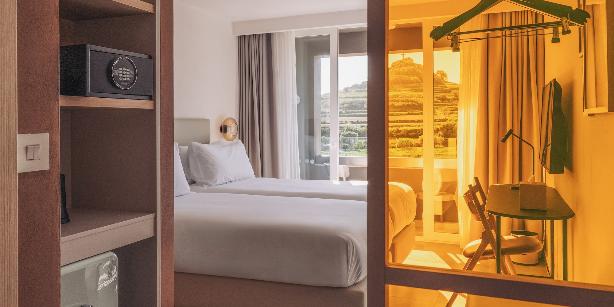 a room with two beds and a closet