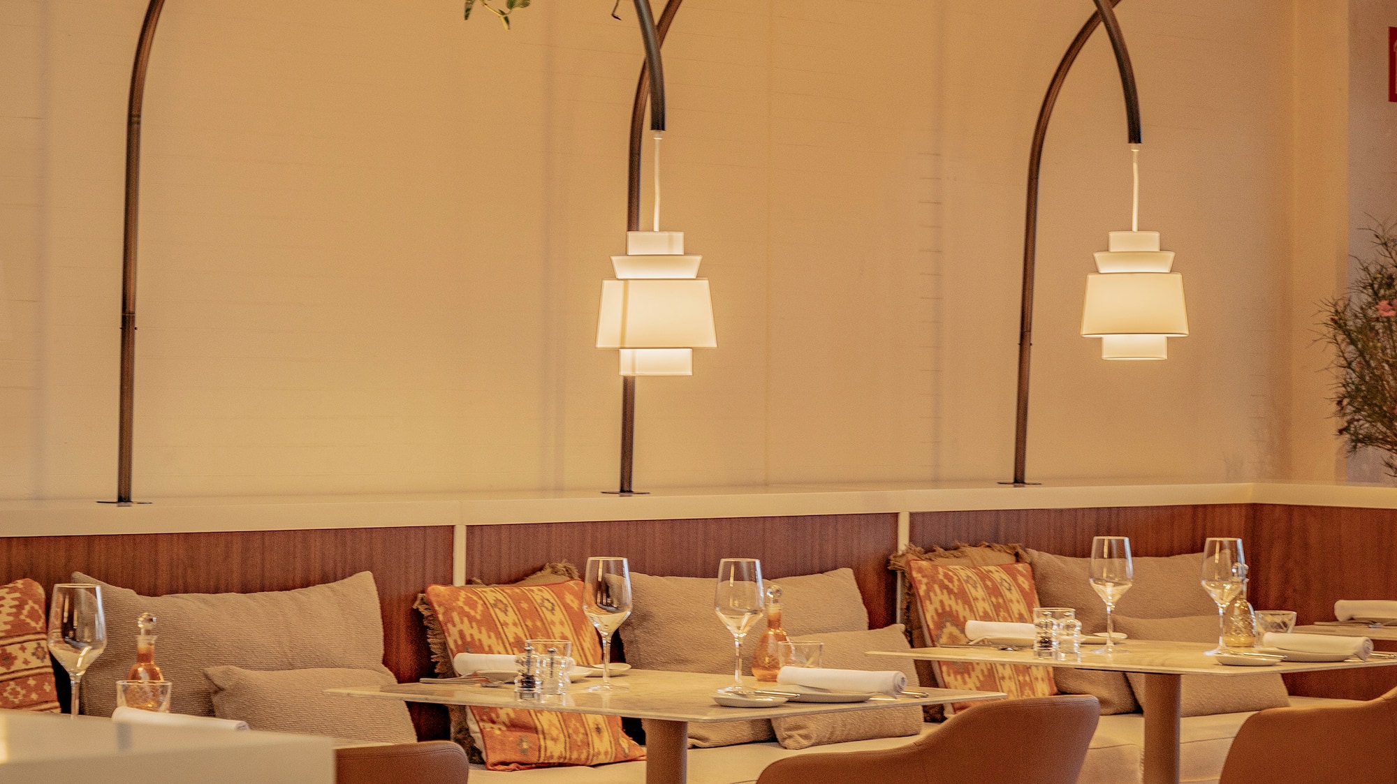 a restaurant with tables and chairs