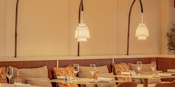 a restaurant with tables and chairs