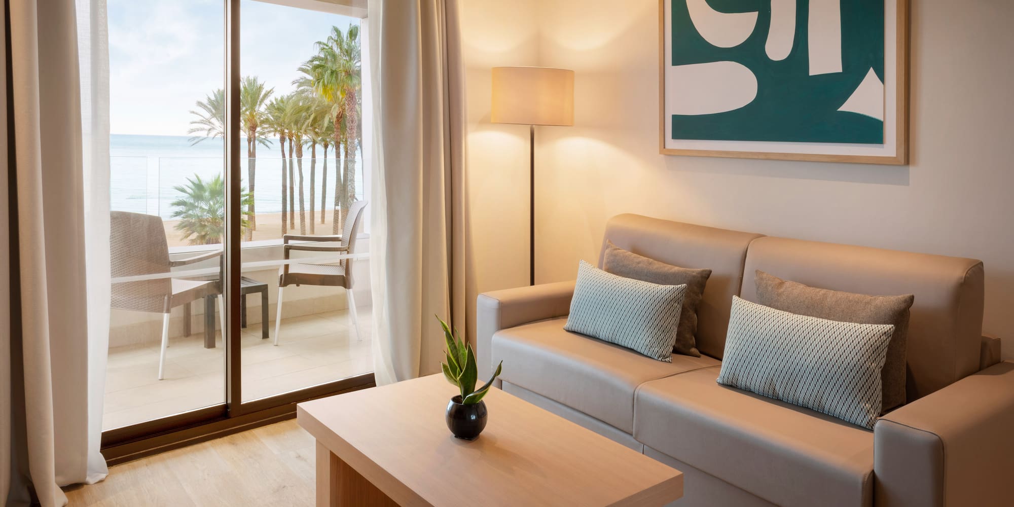 a living room with a couch and a table