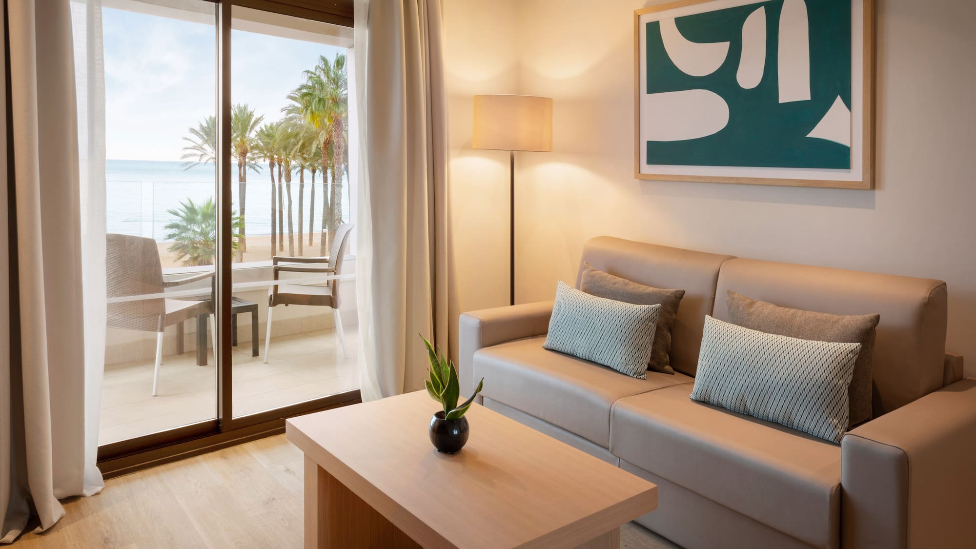 a living room with a couch and a table