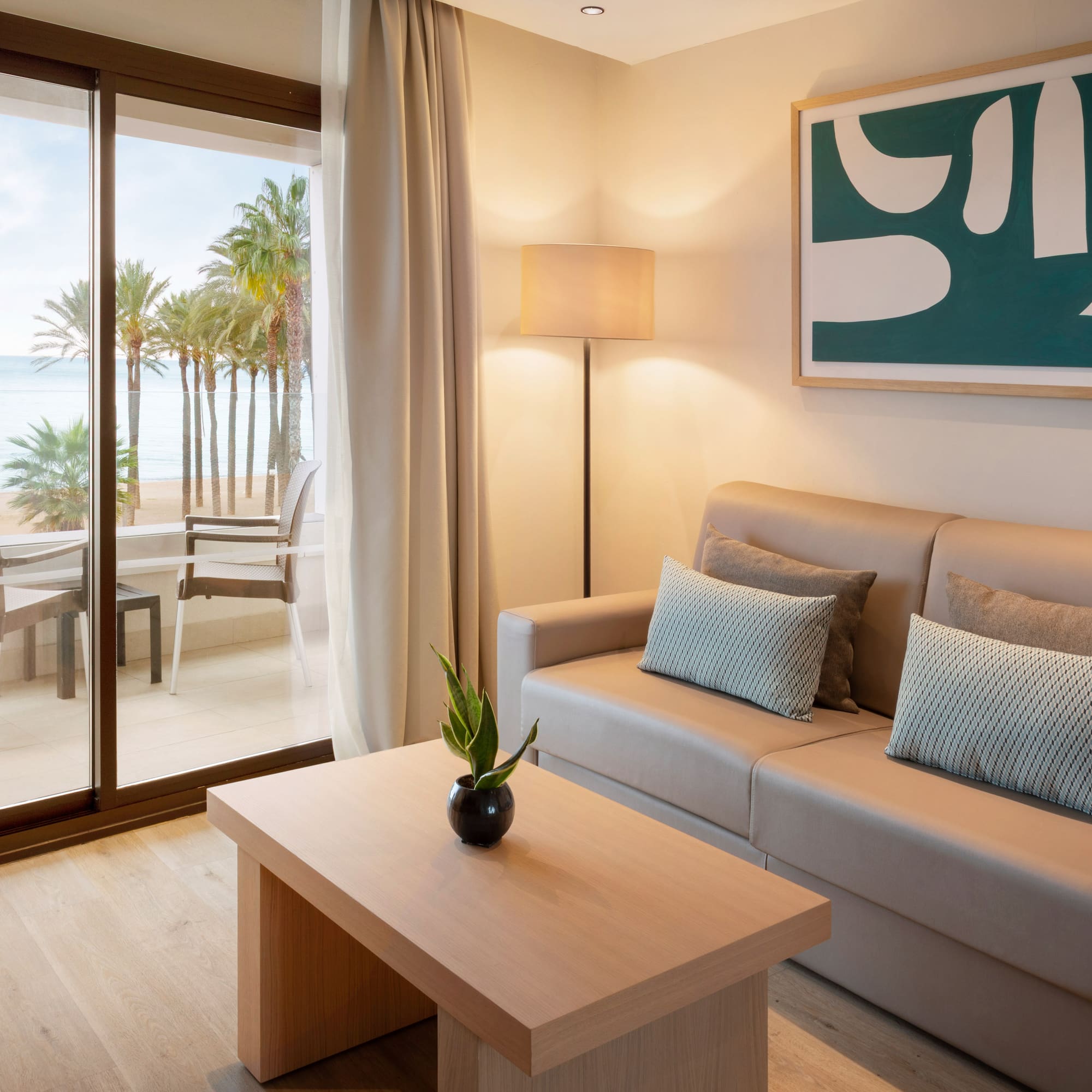 a living room with a couch and a table