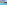 Tropical resort with spacious blue pool, hotel building, and palm trees.