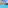 Tropical resort with spacious blue pool, hotel building, and palm trees.