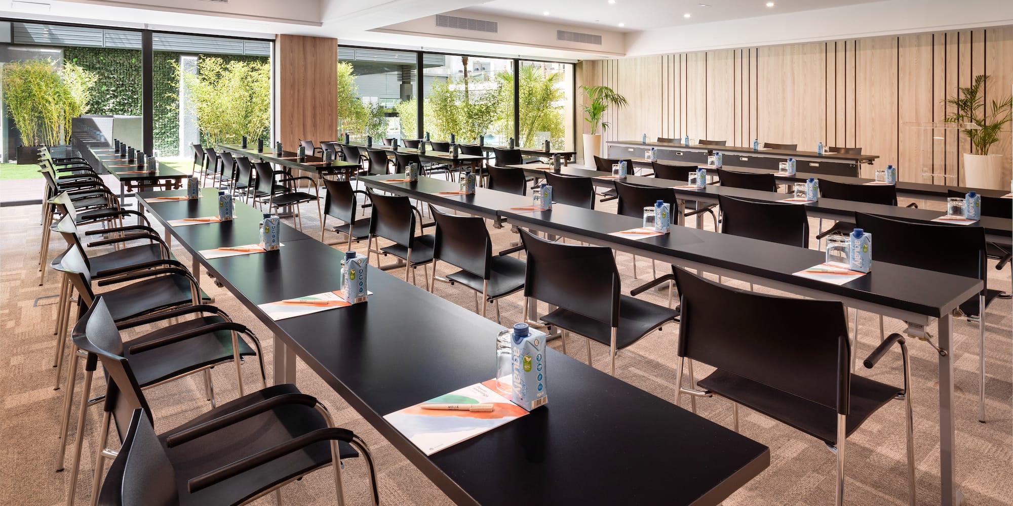 a room with tables and chairs