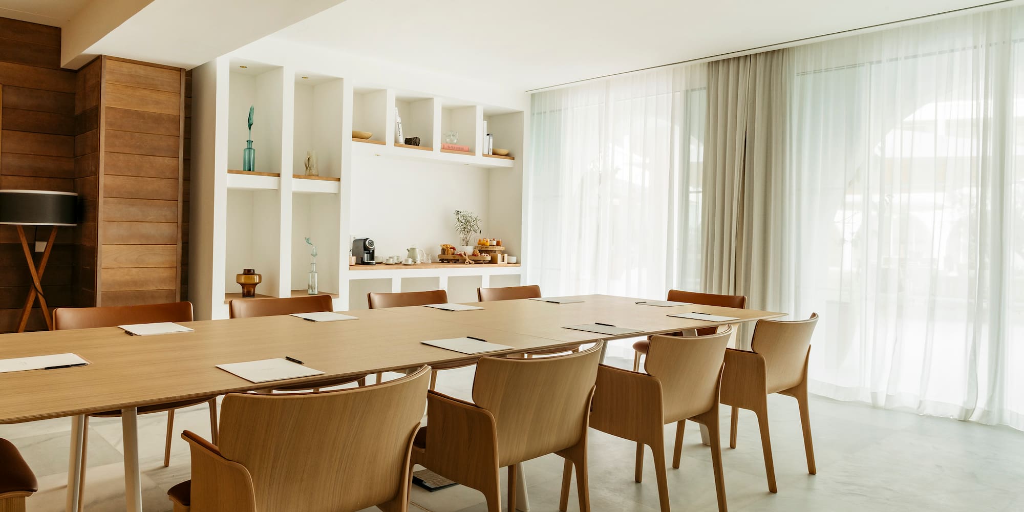 a room with a table and chairs