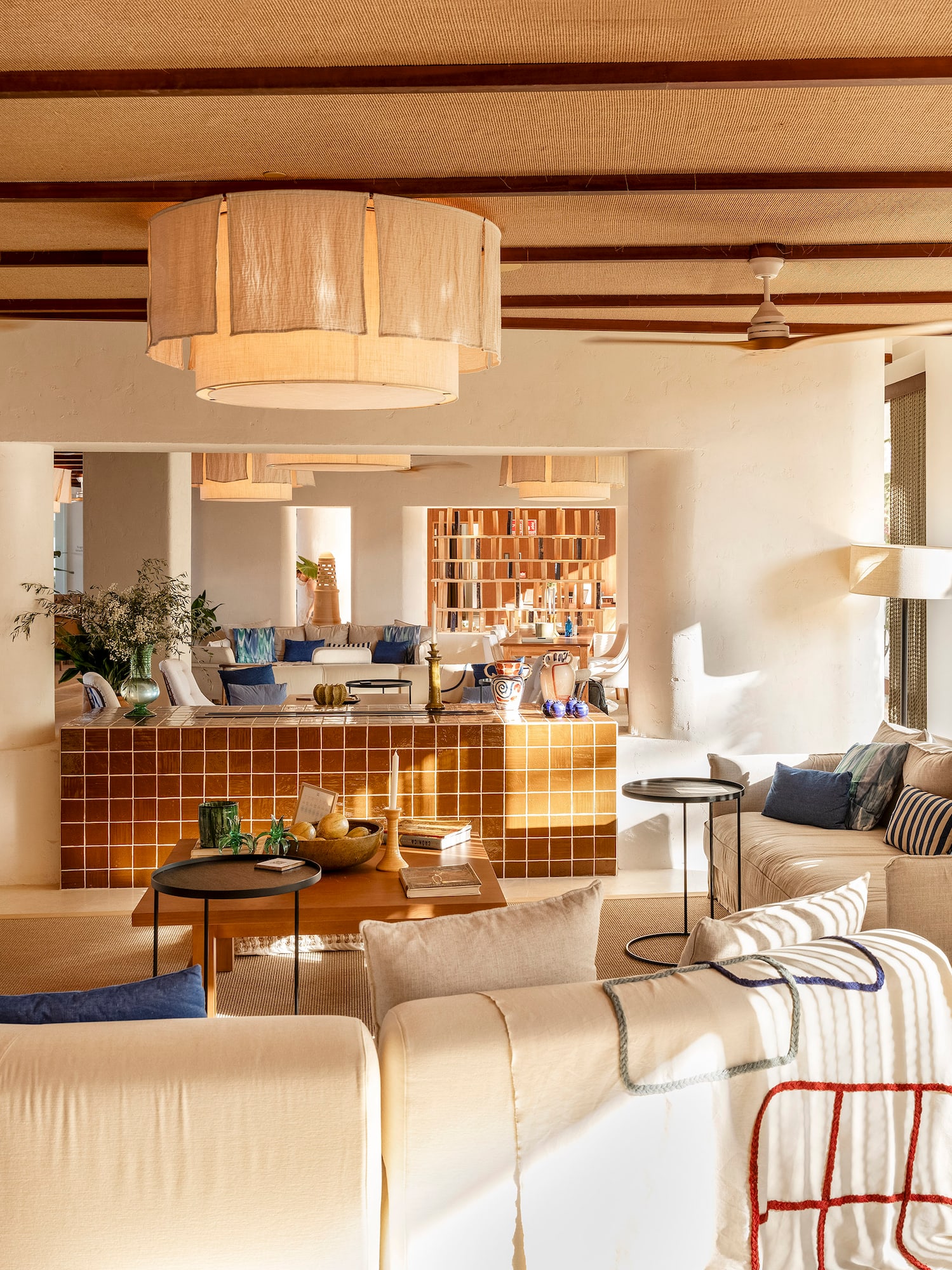 a living room with couches and a table