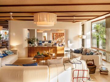 a living room with couches and a table