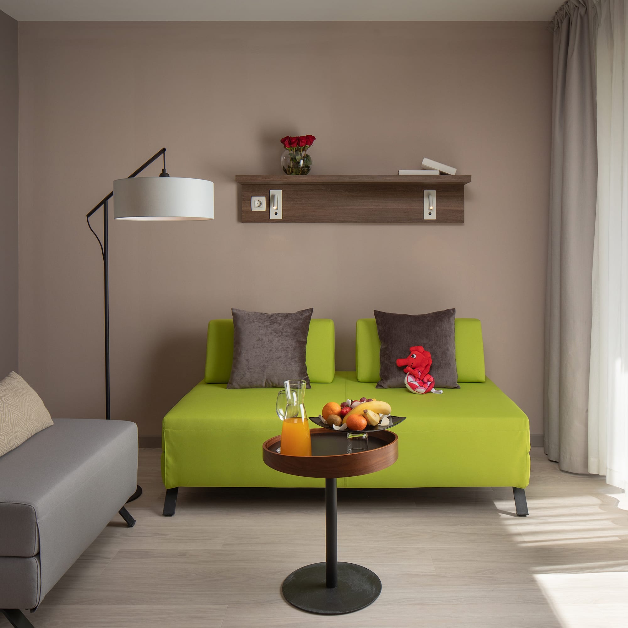 a living room with a couch and a table