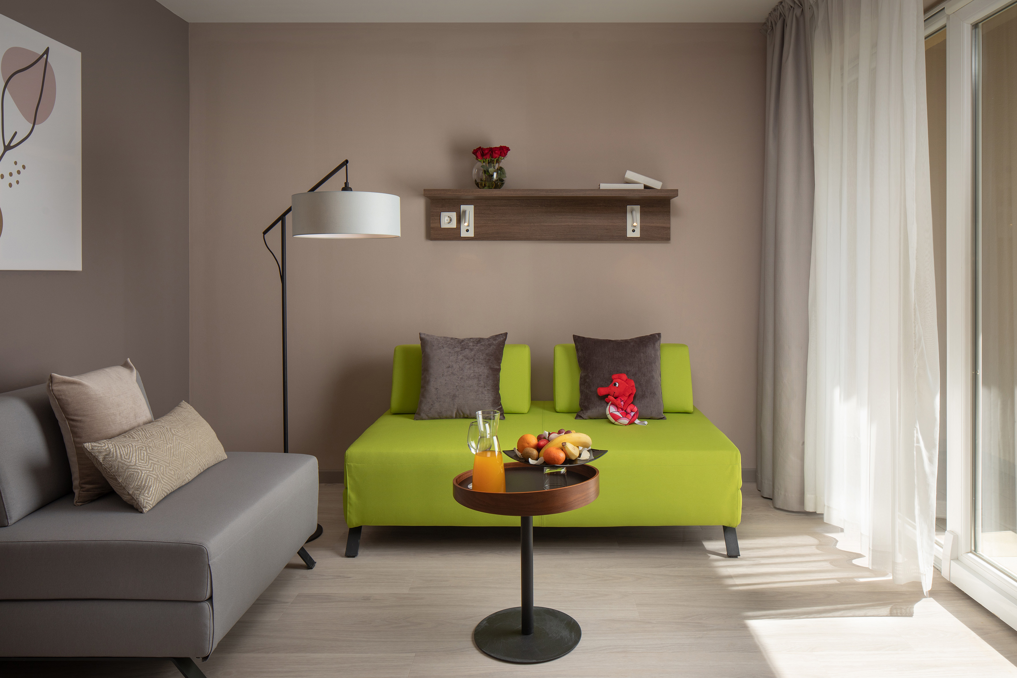 a living room with a couch and a table