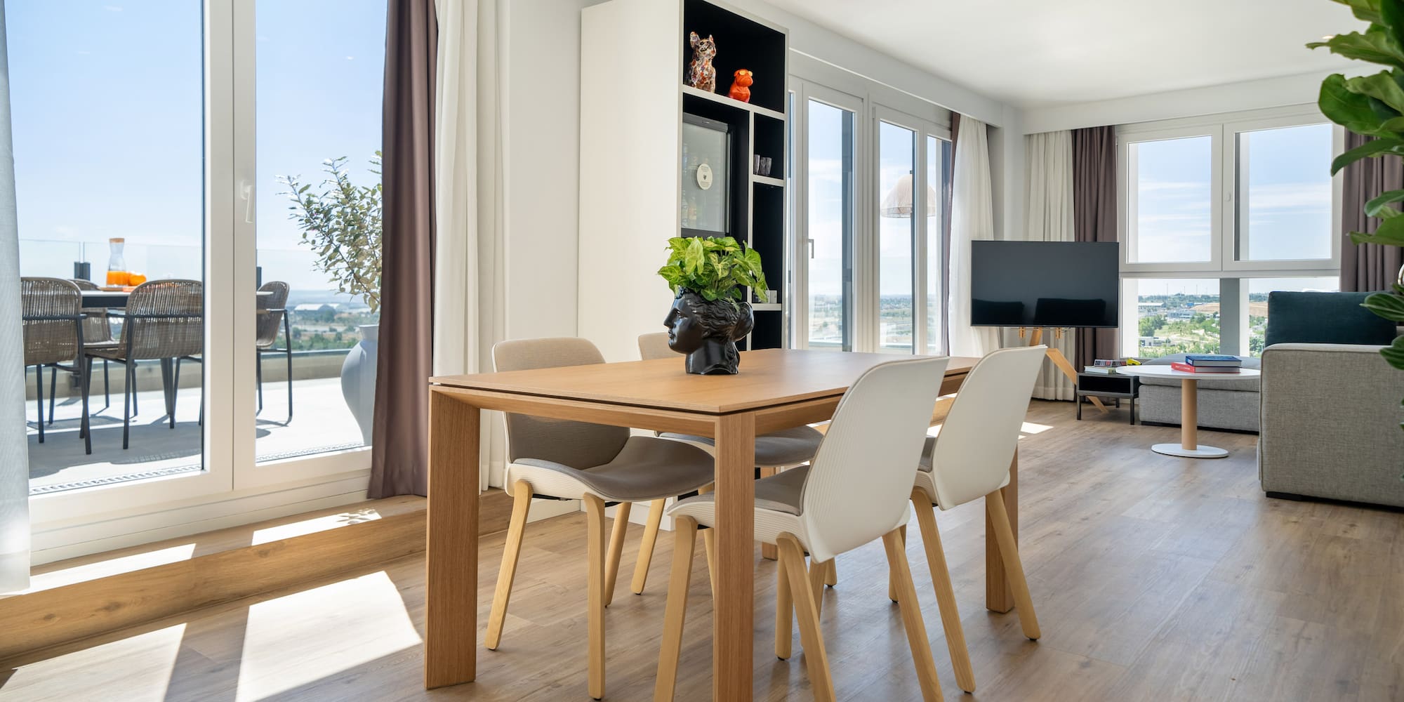 a room with a table and chairs