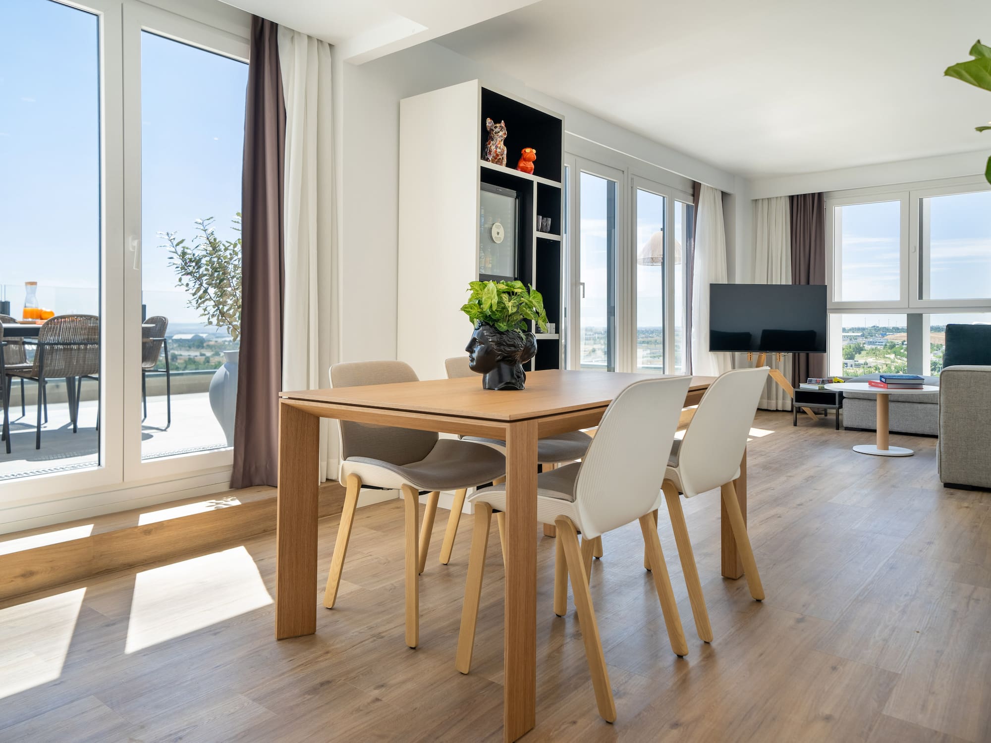 a room with a table and chairs