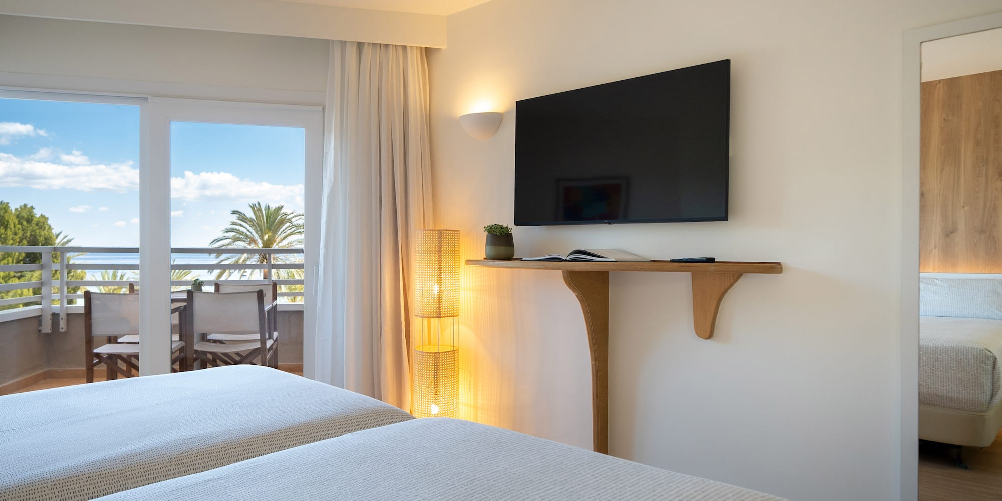 a room with a television on the wall