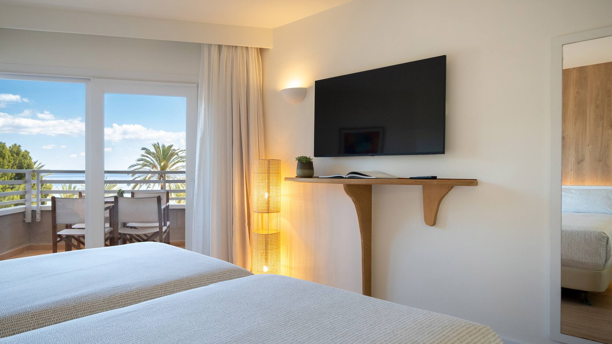 a room with a television on the wall