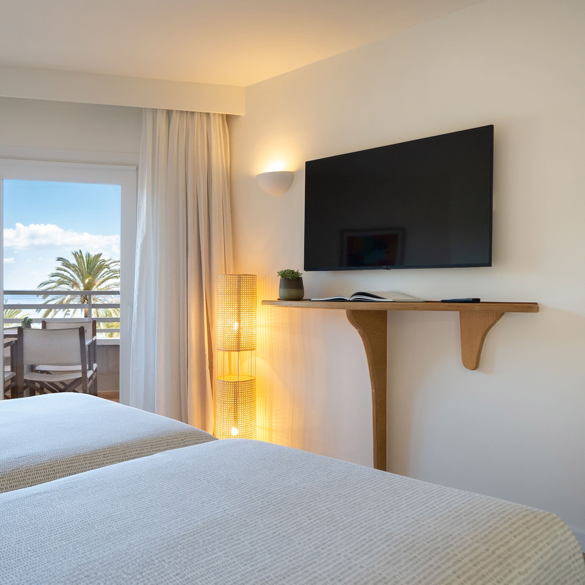 a room with a television on the wall