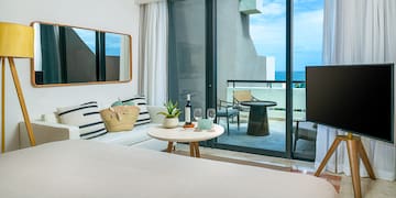 a room with a television and a table