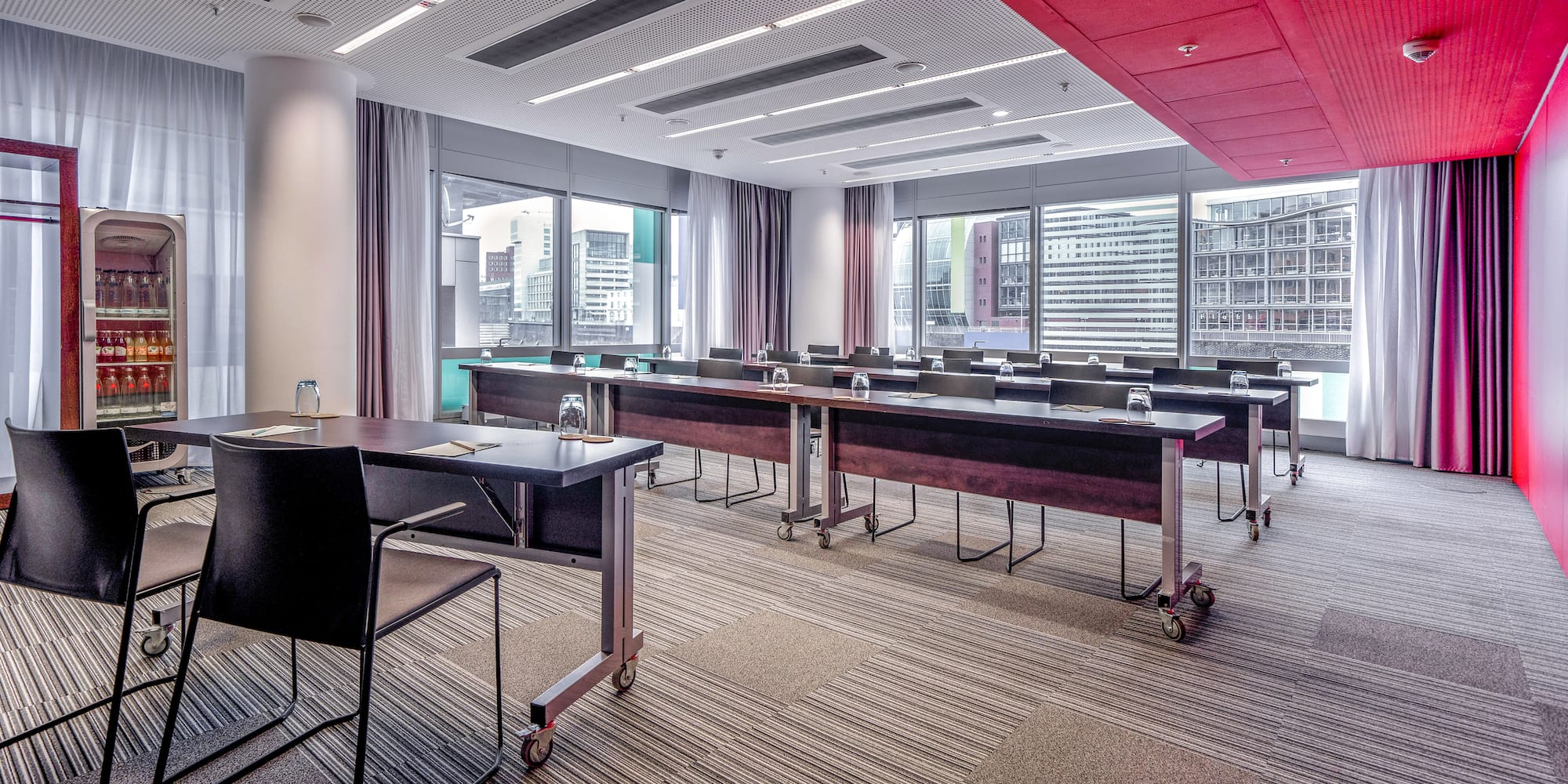 a room with tables and chairs