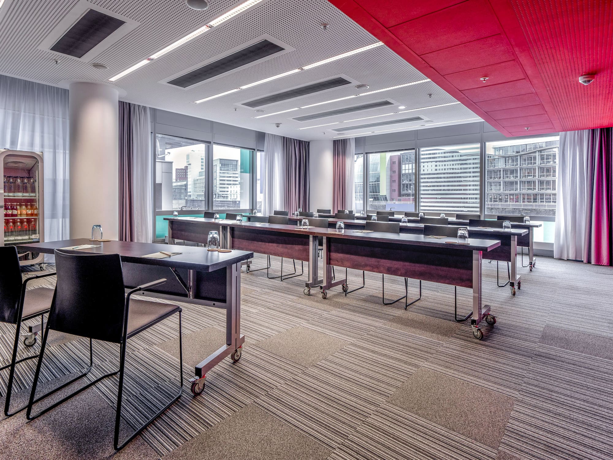 a room with tables and chairs