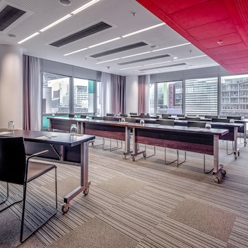 a room with tables and chairs