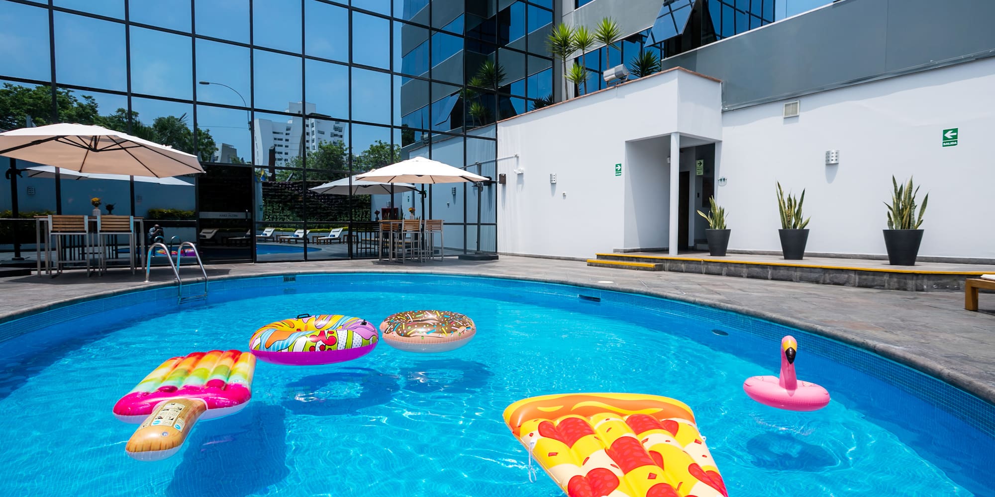 a pool with floating toys in it