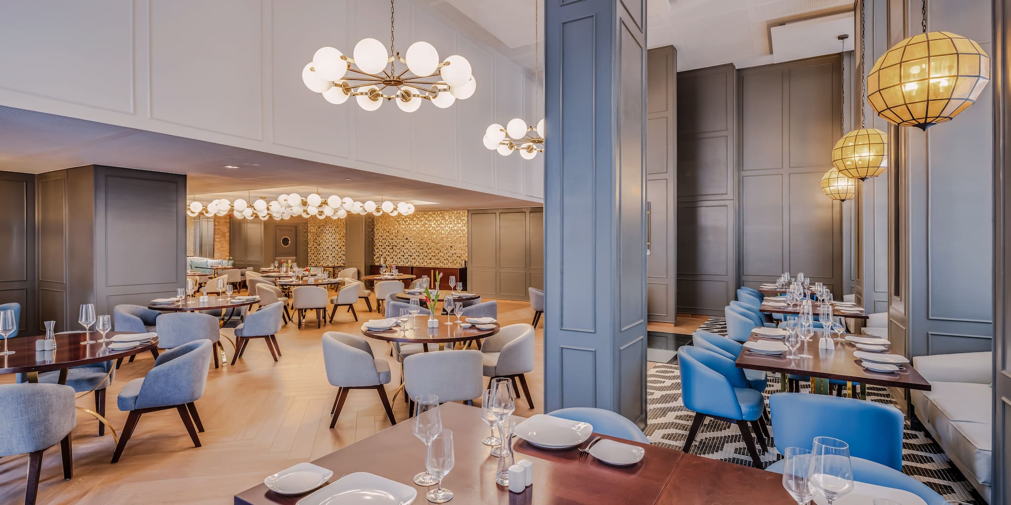 a restaurant with tables and chairs