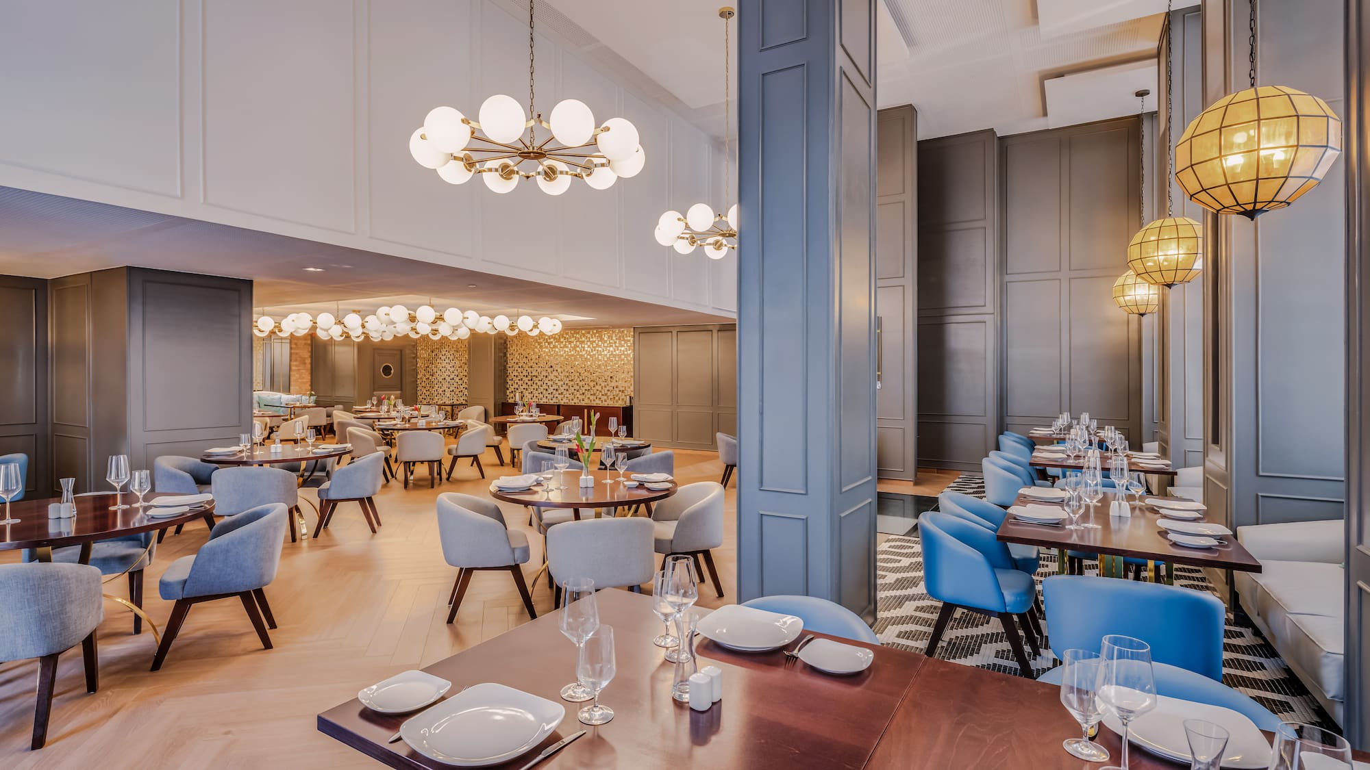 a restaurant with tables and chairs