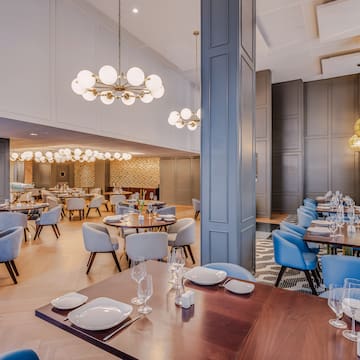 a restaurant with tables and chairs