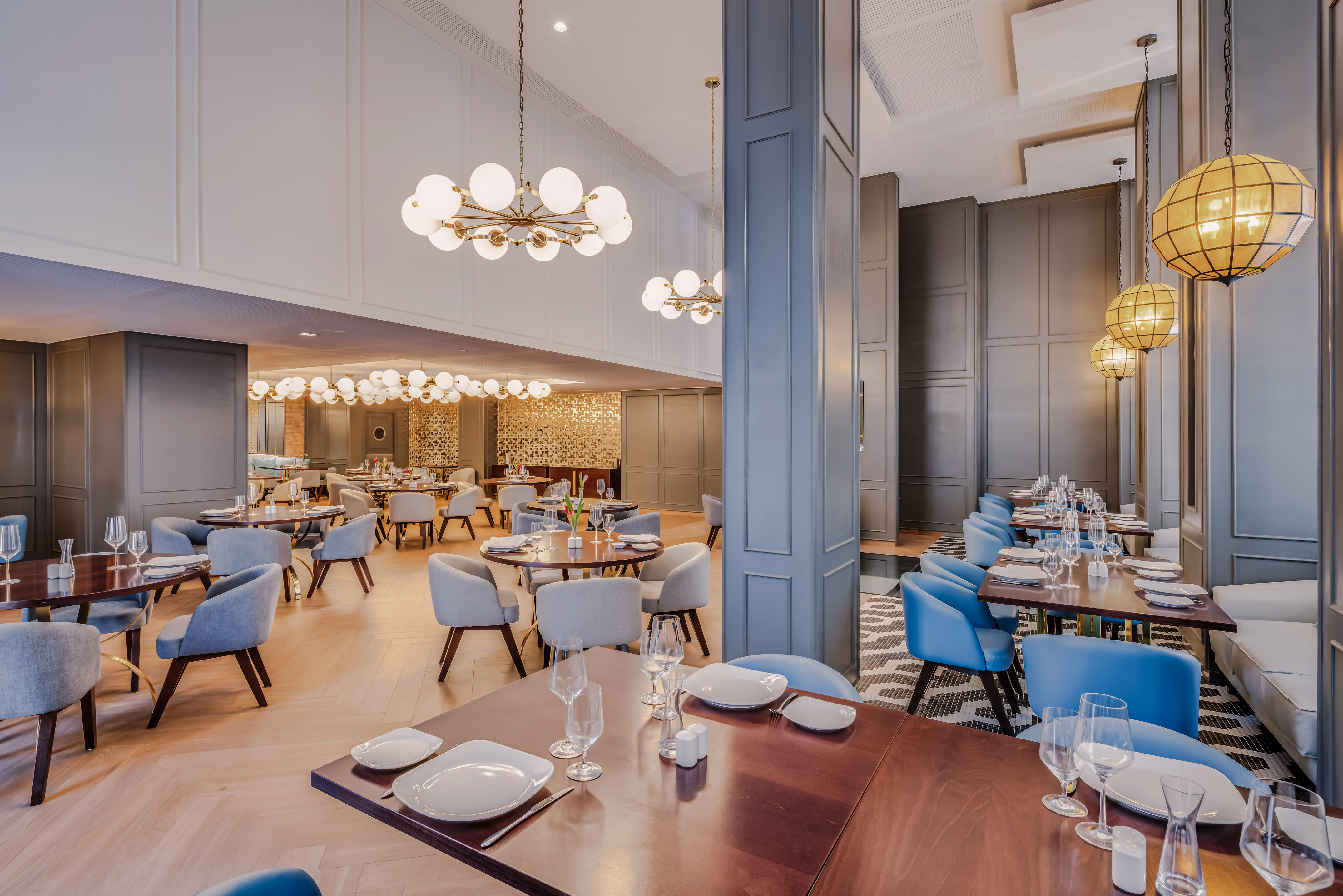 a restaurant with tables and chairs